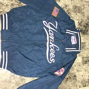 This Vintage Jacket is in great shape But there is a little stain on the collar.